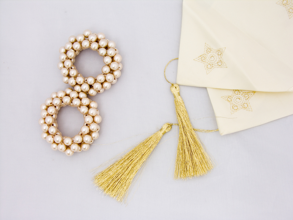 Servilletas con borlas.