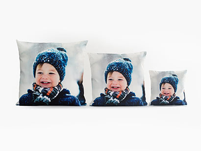 Cojines con fotografías familiares.