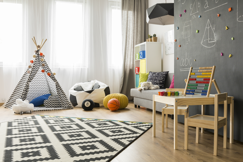 A playroom with teepee.