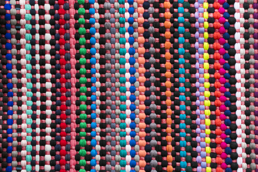 Alfombra de bola de colores de fieltro.