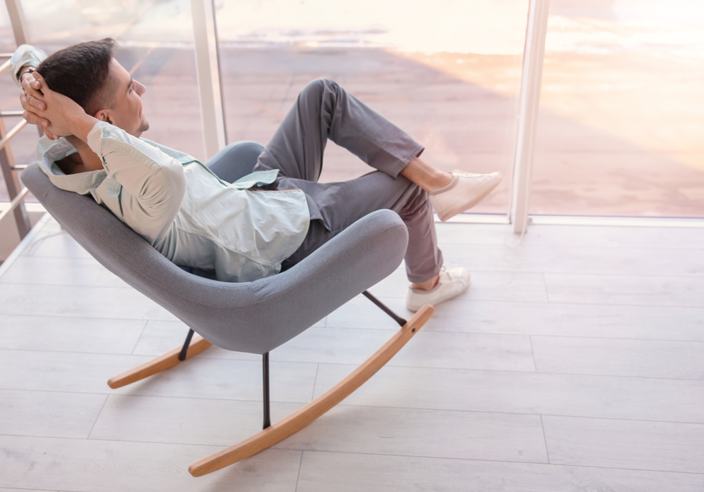 An armchair style rocking chair.