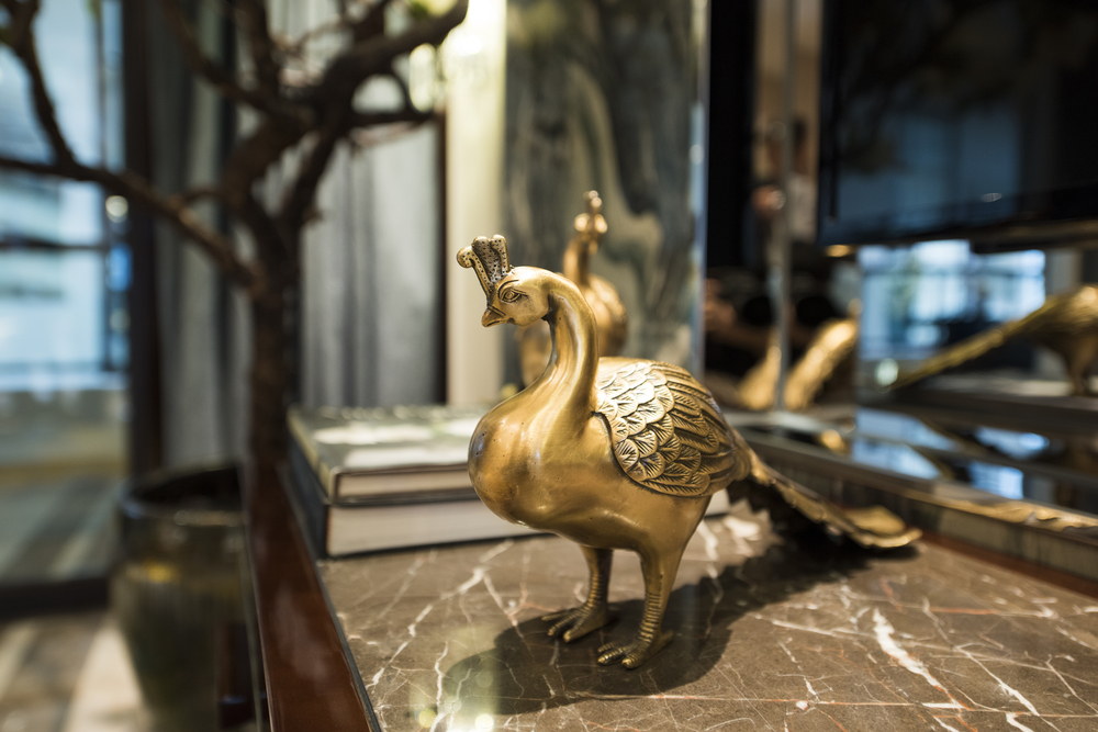 Escultura del pavo real.