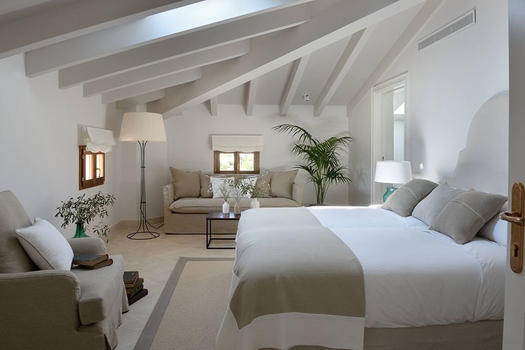 Dormitorio de estilo hotel boutique.