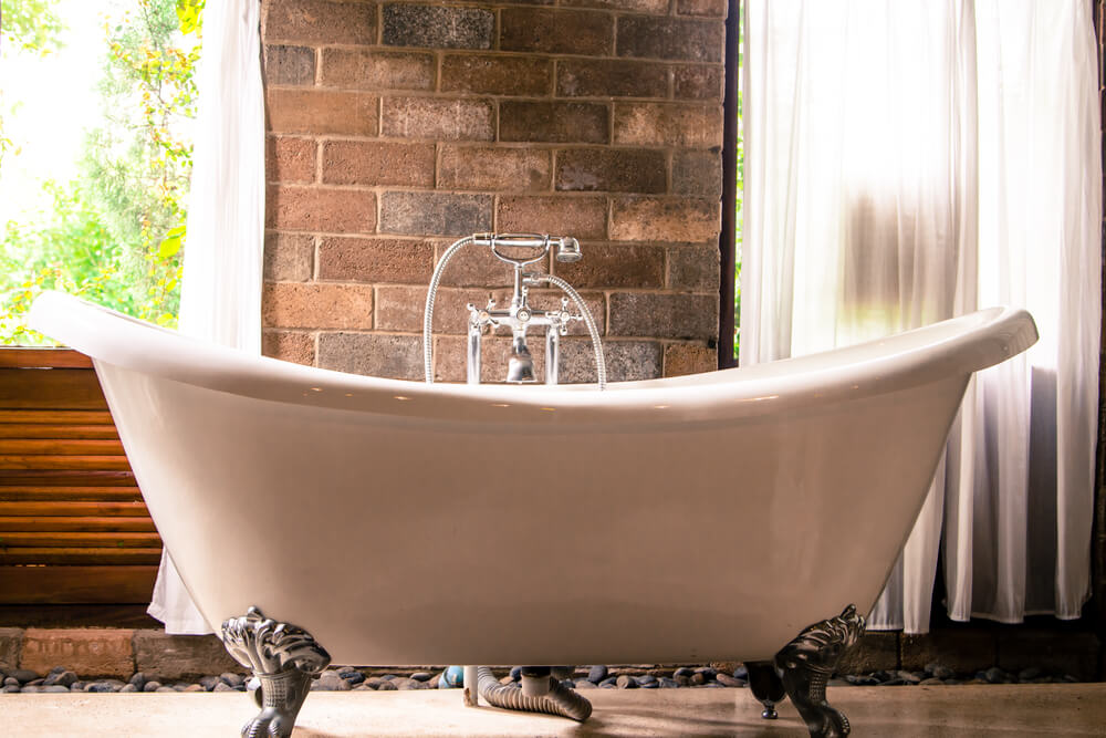 Vintage bathtub with legs.