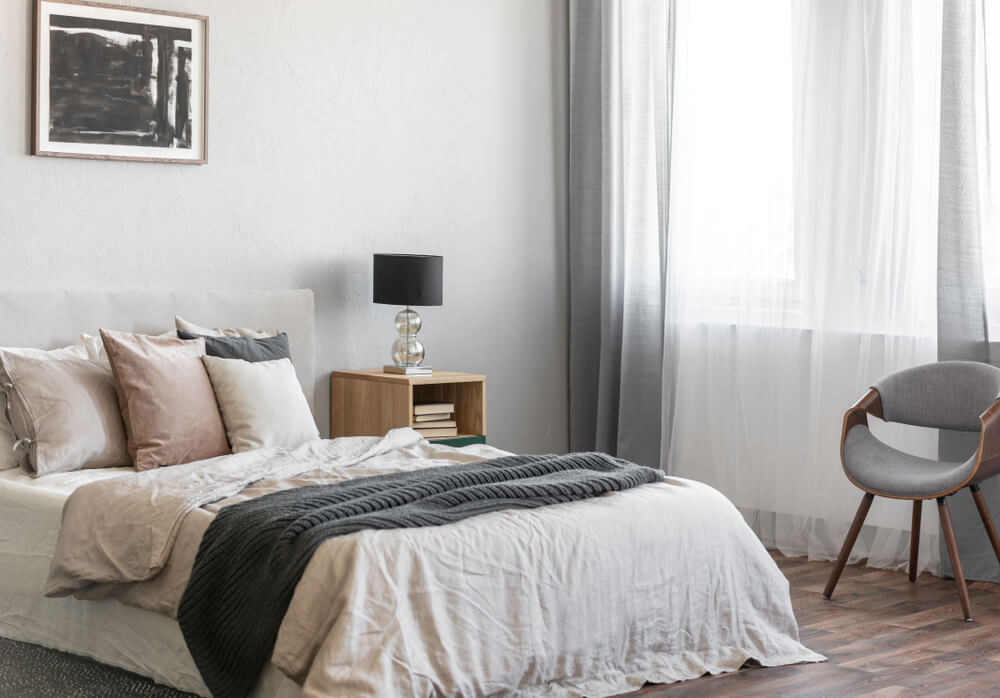 Neutral fabrics for the bedroom.