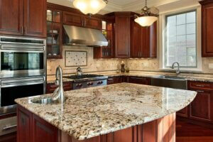 The island is a good space to use terrazzo in the kitchen.