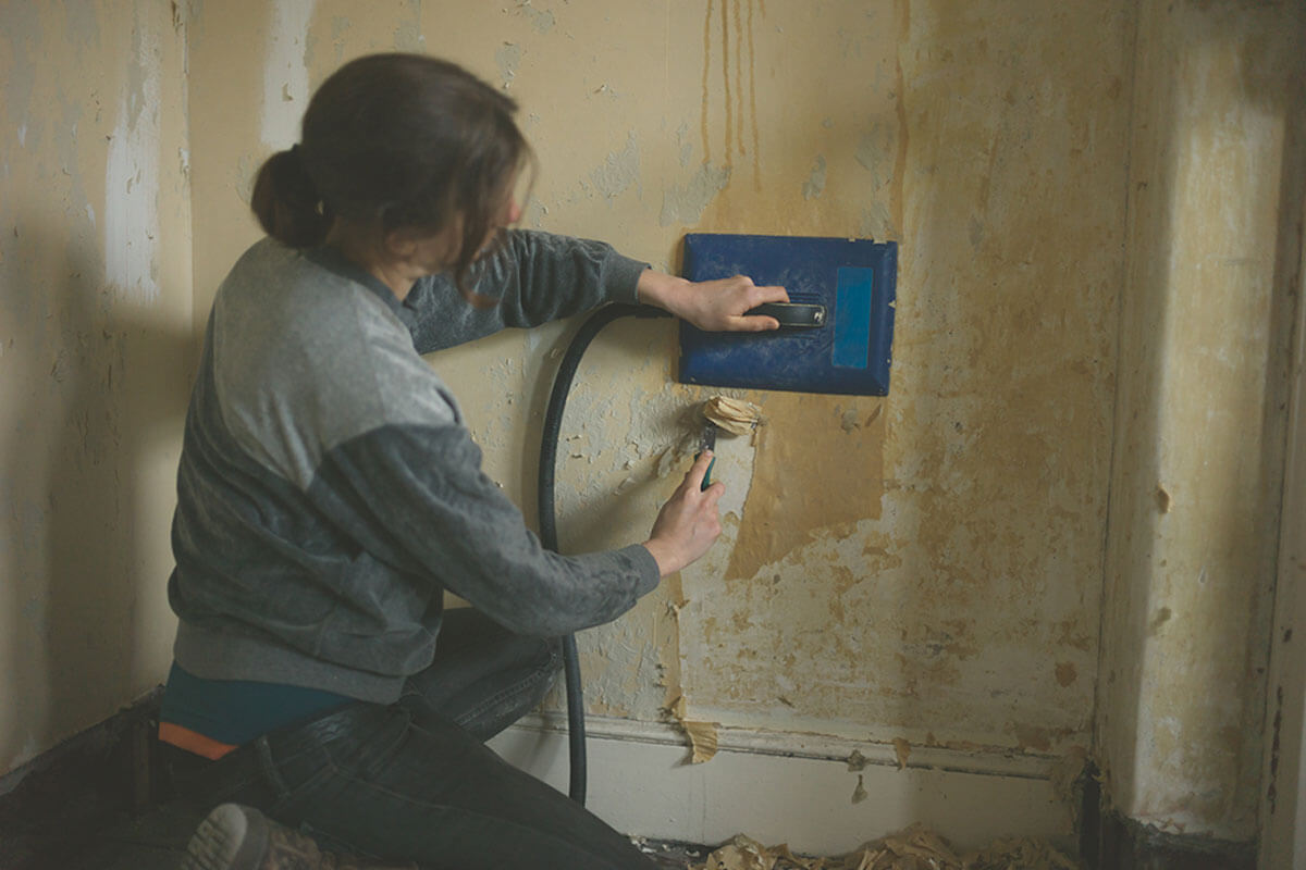 Use a steamer to remove the wallpaper.