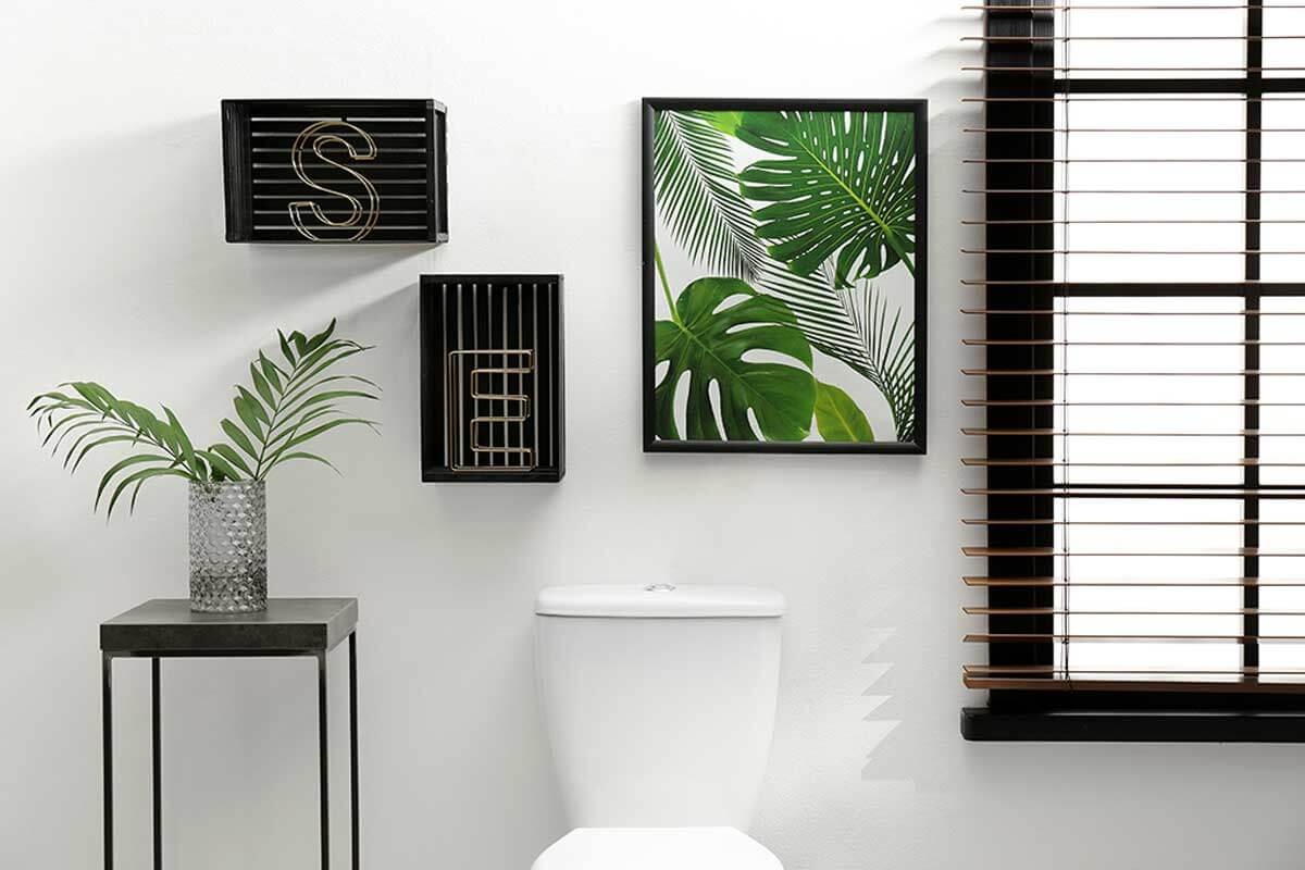 Decorate the contrasting wall with paintings and decorative objects.